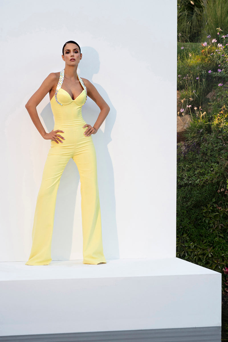 Yellow corseted jumpsuit with beaded halter neck