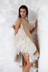 Sleeveless sand color mikado gown with an exploded ruffle in ivory silk organza and tulle