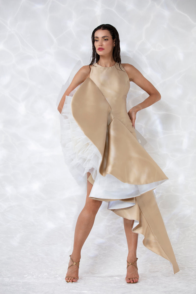 Asymmetric sand color mikado gown with an exploded ruffle in ivory silk organza and tulle