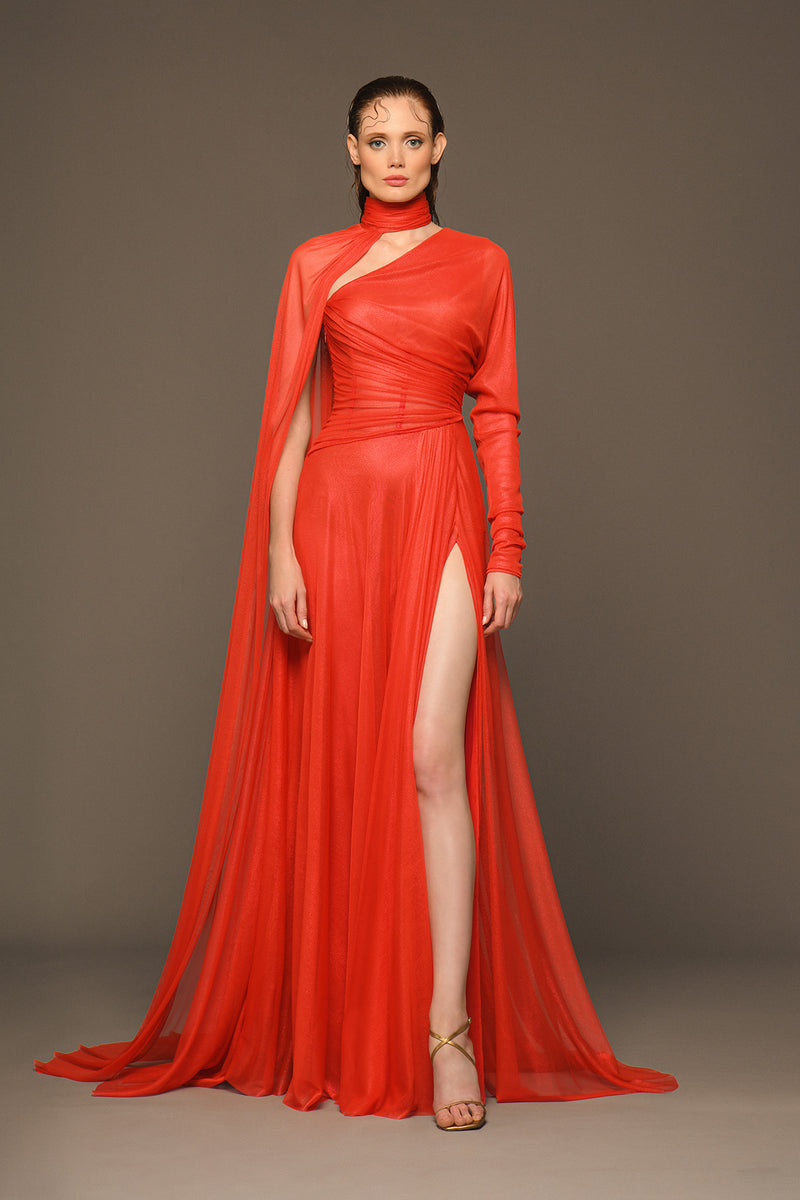 Orange red one-shouldered draped dress in silk foiled tulle with a choker cape