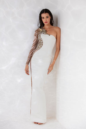 Crystals, glass beads, macro sequins, and metallic thread-work embroidered one sleeve white silk crêpe gown, lavishly illustrated with a seahorse