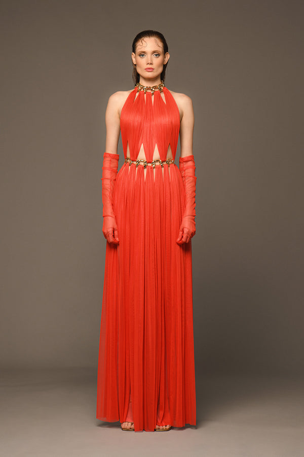 Orange red dress with cutouts, chains and gloves