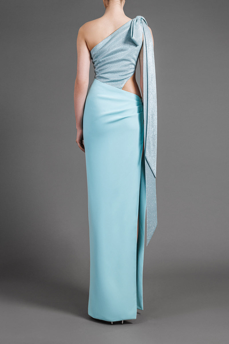 One-shoulder aqua green dress in lurex and crêpe with bow detail and waist cutout