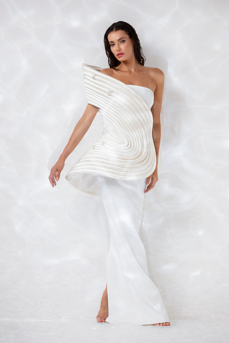 Structured bustier handcrafted in pearl white silk satin 3D tubes, alongside a corseted crêpe gown
