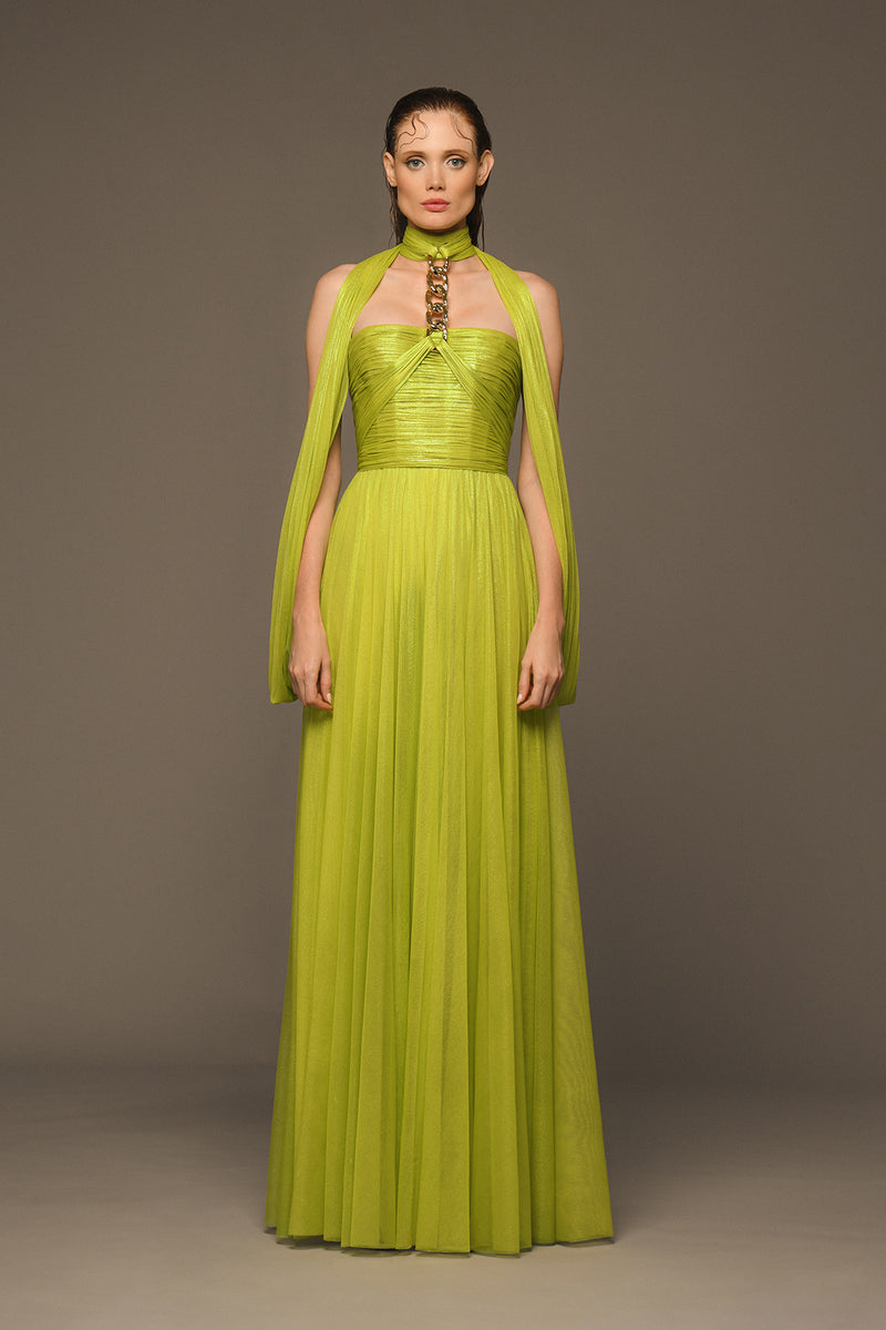 Lime green draped dress in silk foiled tulle with chain and gloves