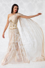 Gold-plated corset handcrafted from solid brass, worn with an exquisitely draped asymmetric gown in gold foiled silk tulle
