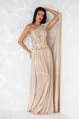Sleeveless draped asymmetric gown in gold foiled silk tulle, worn with a gold-plated corset handcrafted from solid brass