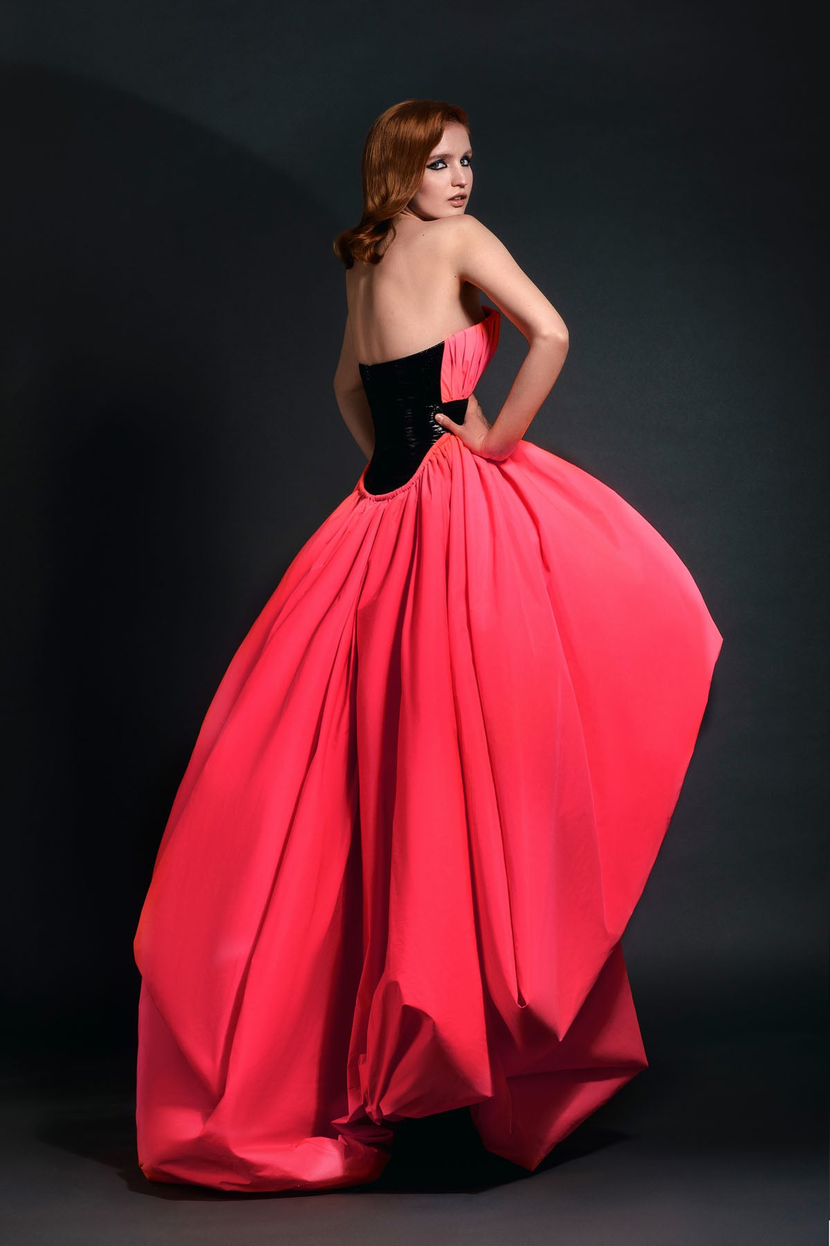 Neon pink puffball gown with black belt Neon pink puffball gown with black belt