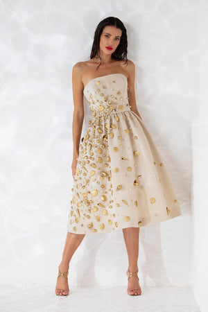 Sleeveless corseted sand color faille midi gown embroidered with pearls and hand painted shells