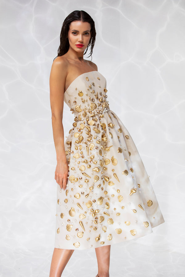 Corseted sand color faille midi gown embroidered with pearls and hand painted shells