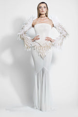 Strapless ivory corseted bustier accompanied with a hooded bolero jacket embellished with 3D laser-cut plumes and a skirt in silk jersey