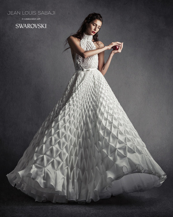 White silk gazar bridal gown with diamond honeycomb smocking embellished with Swarovski crystals