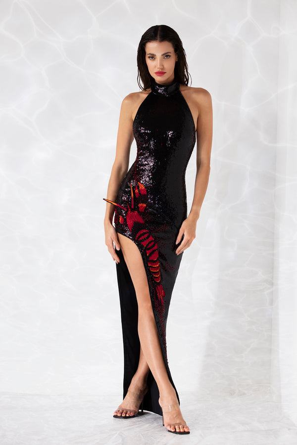 Halter dress in jet black sequins featuring a lobster embroidered in crystals, glass beads, sequins, and silk thread-work