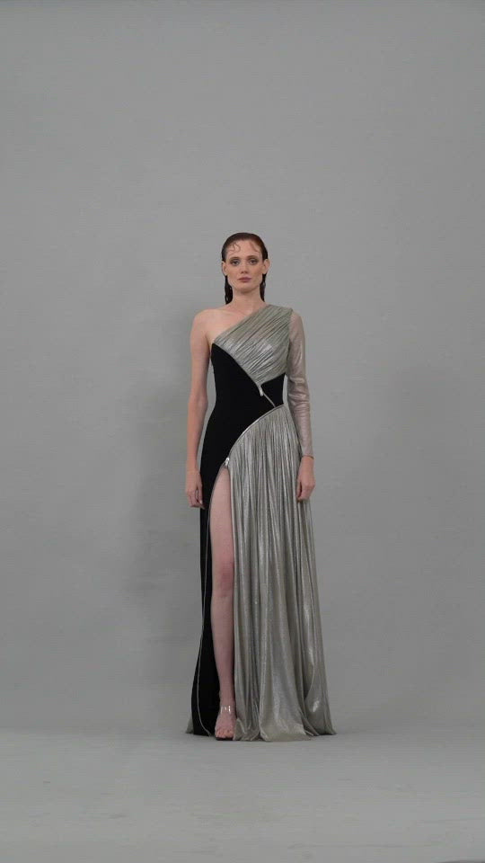Asymmetrical black crêpe dress with silver draping in silk foiled tulle and zippers