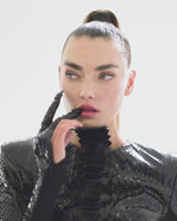 Round neck high-gloss black python dress with built-in two fingered gloves and finished with Swarovski crystal nails