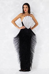 Strapless scallop shell inspired dress consisting of a bustier embroidered with crystals and glass beads, a skirt in hanging beaded fringes