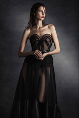 Sleeveless black tulle A-line dress with black velvet and silk gazar detailing