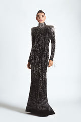 Structured black silk crêpe dress embroidered with bugle beads, crystal baguettes and hanging beaded fringes finished with water ripples effect at the hemline 