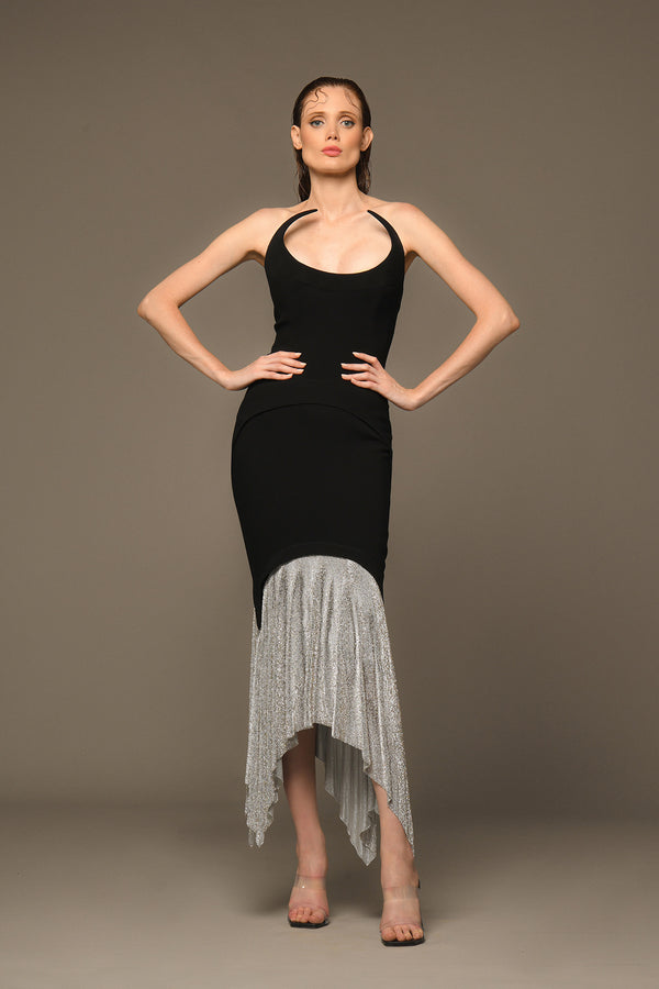 Black crêpe dress with a pointed neckline and crystal chainmail v-skirt