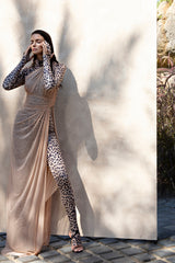 Leopard catsuit under nude tulle draped dress with