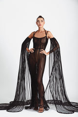 Sheer mermaid signature dress in black latex and tulle worn with cape sleeves handcrafted in 3D tubes