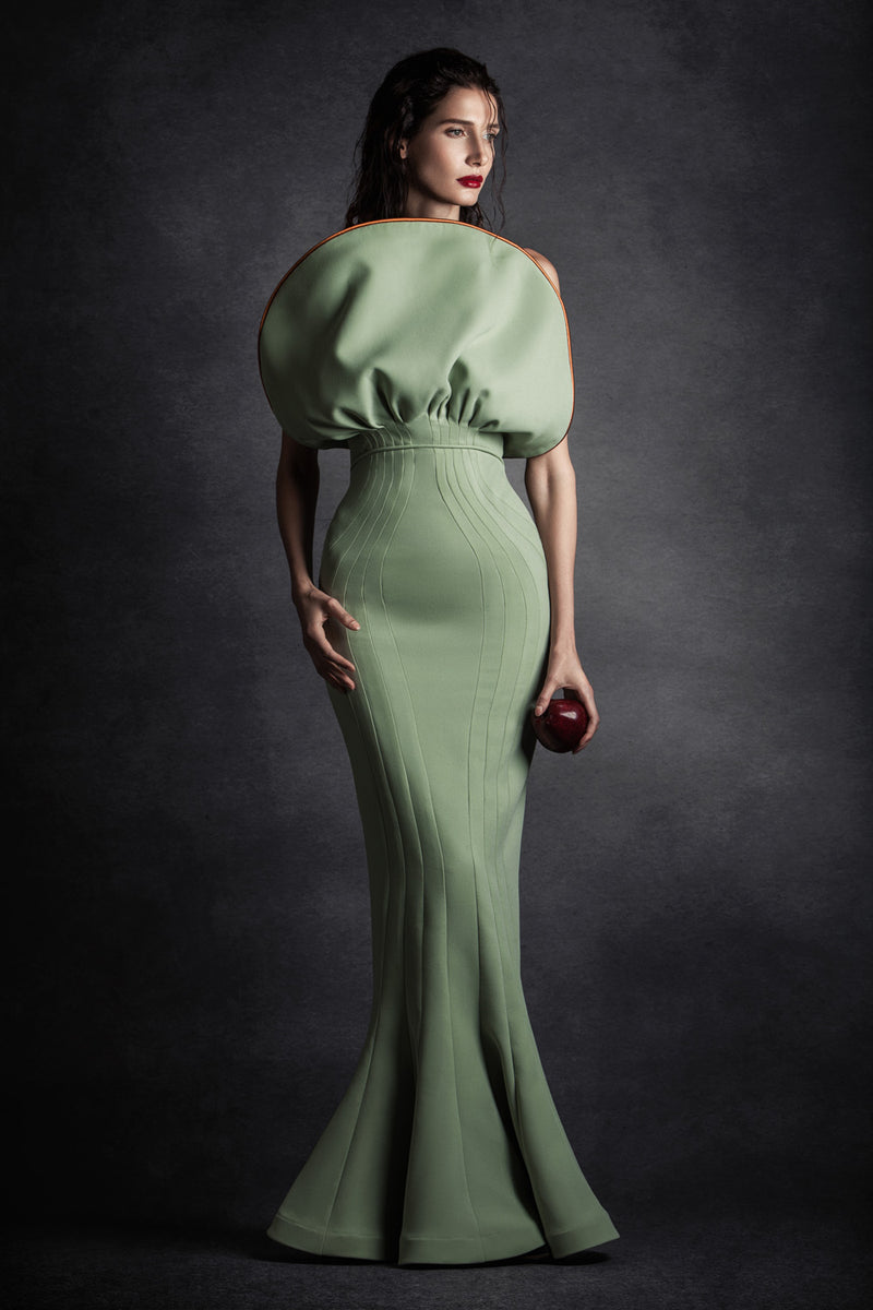 Green silk crêpe mermaid dress with oversized structured bust