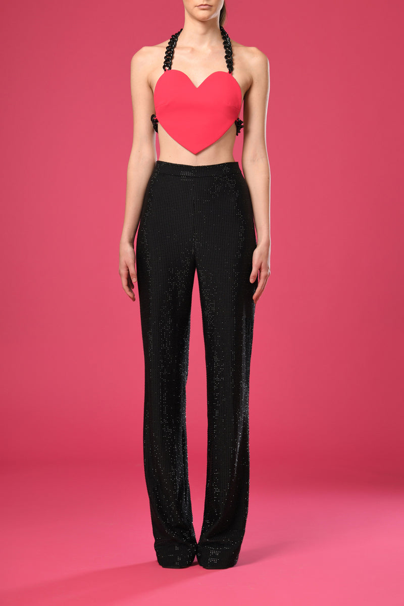 Black suit with black rhinestones and a pink heart shaped top