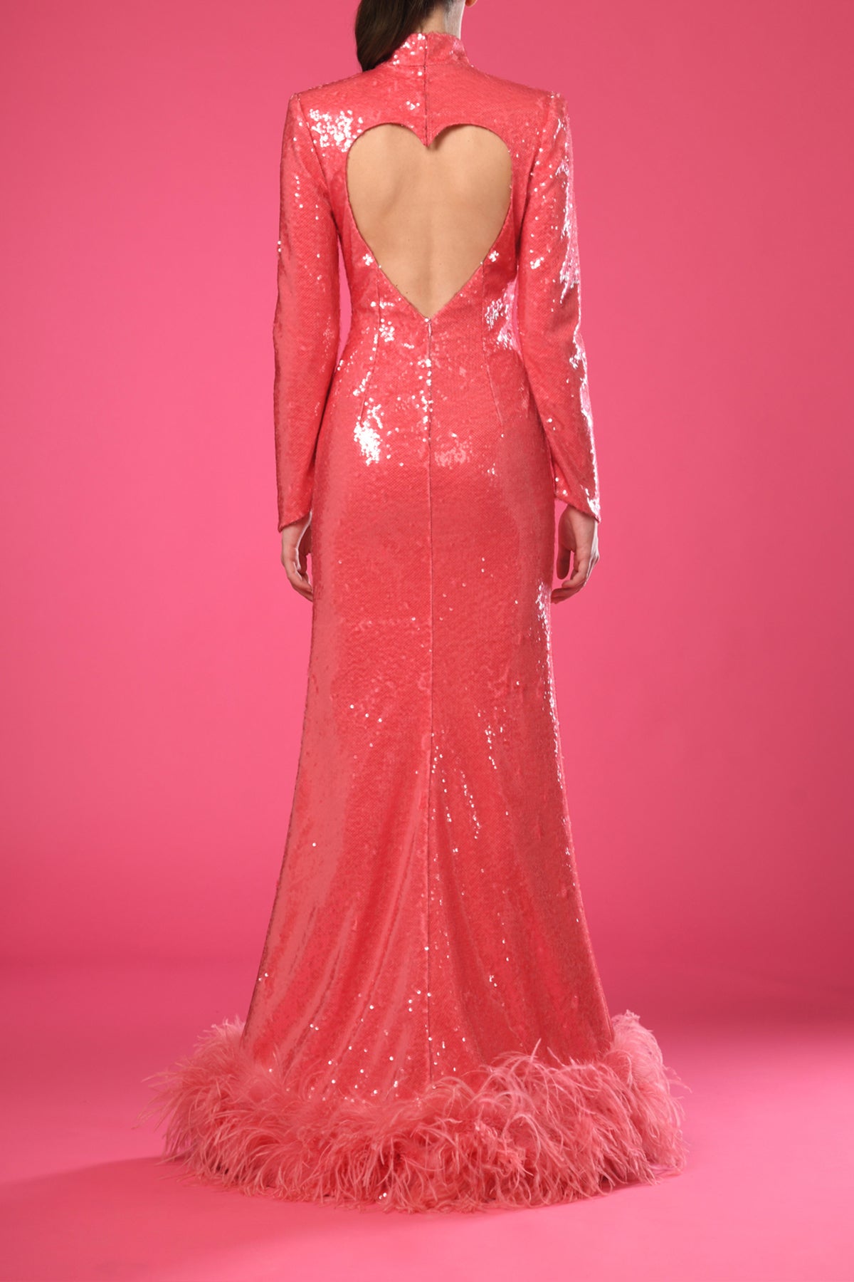 Long sleeved pink sequins dress with boa feathers on hem