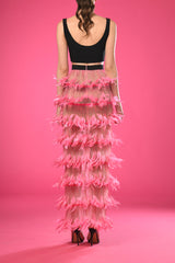Black crop top with pink feathered skirt