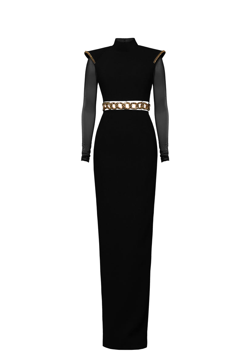 Black crêpe dress with chain belt, structured shoulders and tulle sleeves