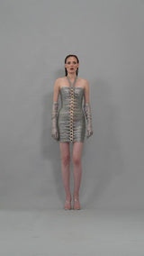 Silver halter draped mini dress with chains and gloves