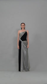 Black crêpe dress with silver draping in silk foiled tulle and silver chains