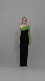 One-sleeved black crêpe dress with green crystal chainmail